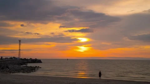Sunset on the sea with a beach, time-lapse Stock Footage 315414289