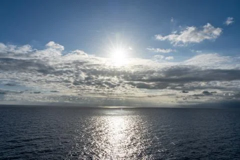 Sunset on the sea with beautiful cloud patterns Stock Photos