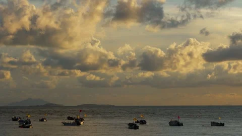 Sunset Sea with Boats Dramatic Sky Tyndall Effect Handheld Video stock 347995526