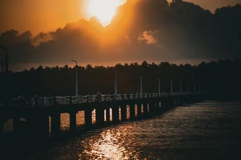 Sunset in the sea bridge Stock Photos