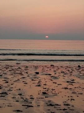 Sunset at sea captured on phone camera Stock Photos