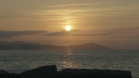 Sunset at sea with clouds and orange colors Stock Footage 297791979