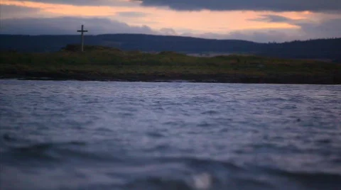 Sunset sea with cross Stock Footage 564988