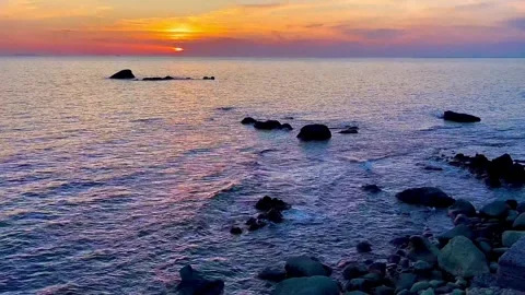 Sunset at sea. Evening. The sun has almost set behind the horizon. Stock Footage 310519601