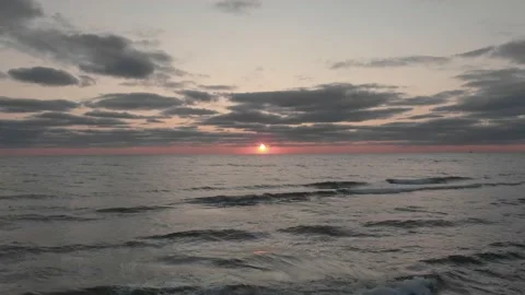 Sunset at the sea with flying seagulls Stock Footage 149431417