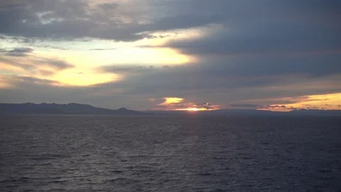 A sunset from the sea Stock Footage 100037409