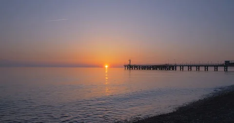 Sunset by the sea Stock Footage 128707942