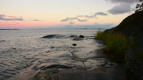Sunset by the sea Stockbeeldmateriaal 138943439