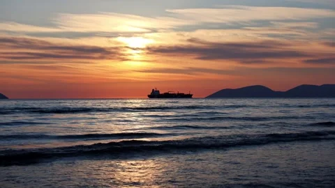 Sunset Sea with Large Ship on Left Side Stock Footage 331873777