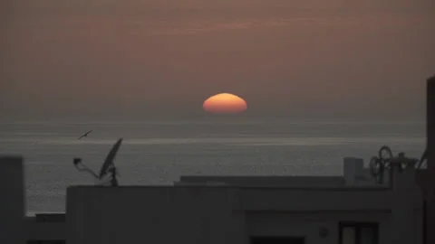 Sunset sea ocean beach morocco dish satellite Stock Footage 238009742