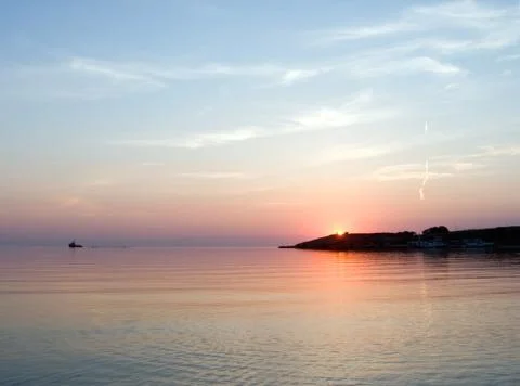 Sunset on sea Stock Photos