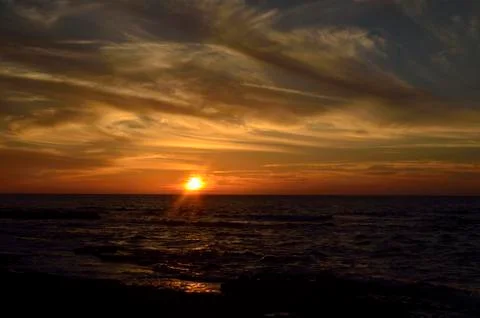 Sunset at sea Stock Photos