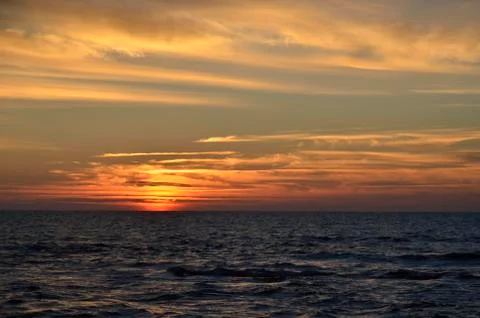 Sunset at sea Stock Photos