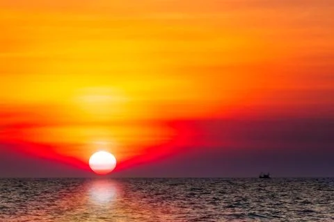 Sunset in the sea Stock Photos