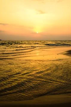 Sunset in the sea Фото