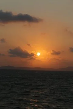 Sunset in the sea Stock Photos