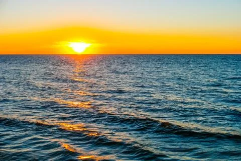 Sunset at sea Stock Photos