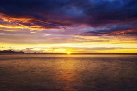 Sunset in the sea Stock Photos