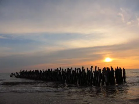 Sunset in the sea Stock Photos