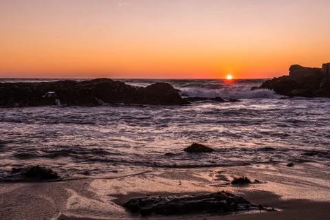 Sunset in the sea Stock Photos