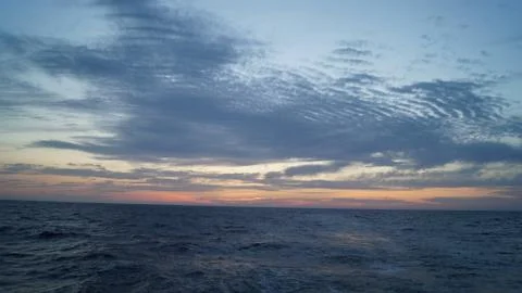 Sunset in the sea Stock Photos