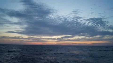 Sunset in the sea Stock Photos