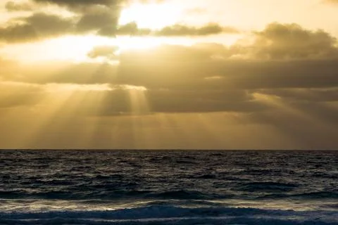 Sunset in the sea Stock Photos