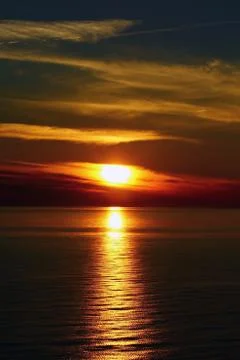 The sunset at the sea Stock Photos