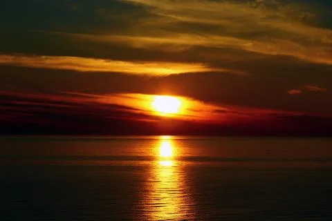 The sunset at the sea Stock Photos