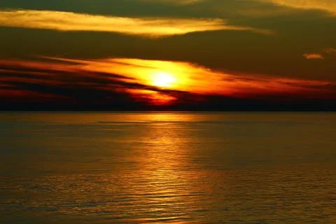 The sunset at the sea Stock Photos