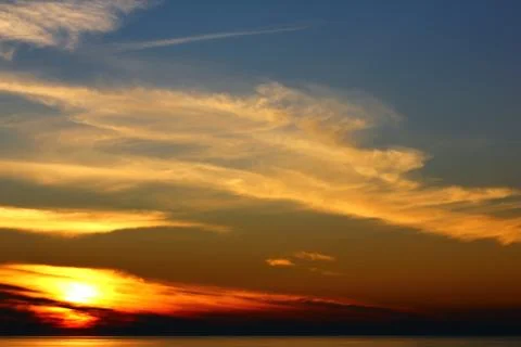 The sunset at the sea Stock Photos