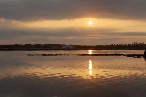 A sunset sea Stock Photos