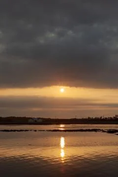 A sunset sea Stock Photos