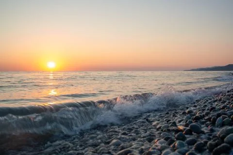 Sunset on sea Stock Photos