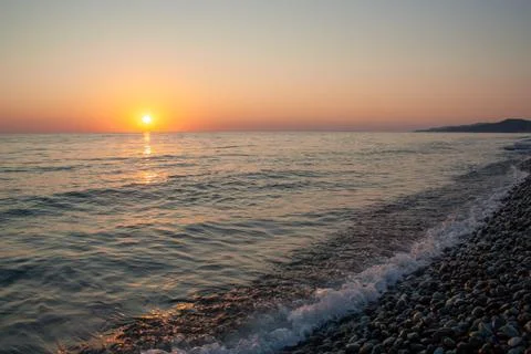 Sunset on sea Stock Photos