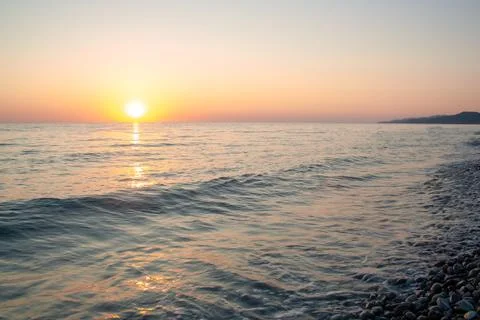 Sunset on sea Stock Photos