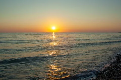 Sunset on sea Stock Photos