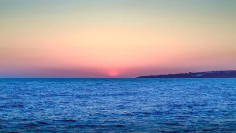 Sunset at the sea Stock Photos