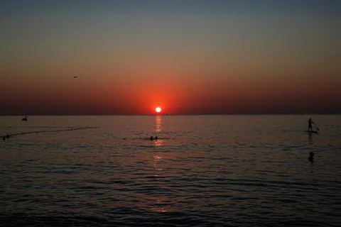 Sunset in the sea Stock Photos