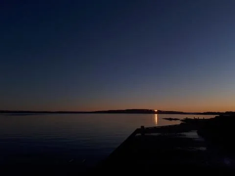 Sunset by the sea Stock Photos