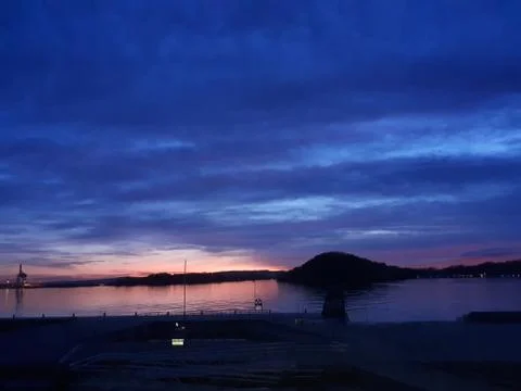 Sunset by the sea Stock Photos