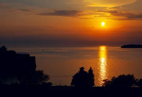 Sunset by the sea Stock Photos