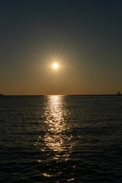 Sunset by the sea Stock Photos