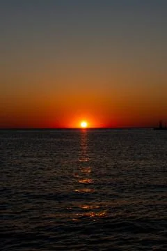 Sunset by the sea Stock Photos