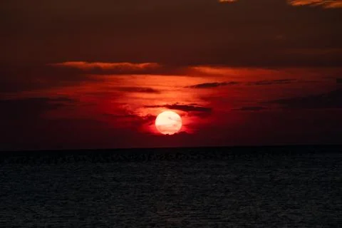 Sunset by the sea Stock Photos