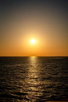 Sunset into the sea 写真素材