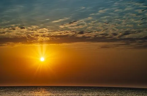 Sunset at the sea Stock Photos