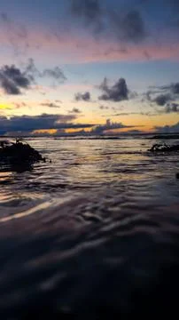 Sunset by the sea Stock Photos