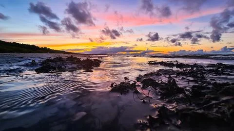 Sunset by the sea Stock Photos