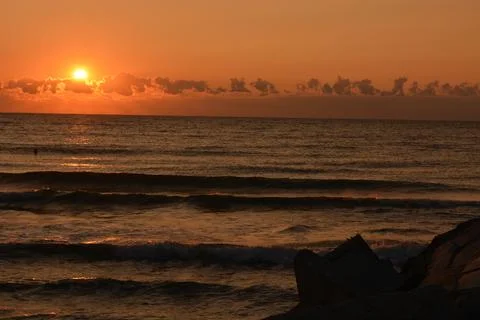 The sunset on the sea Stock Photos